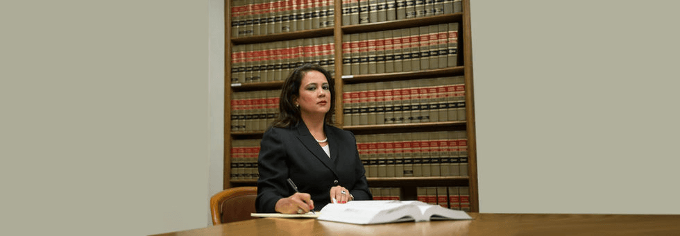 Attorney Millie Laguna at work